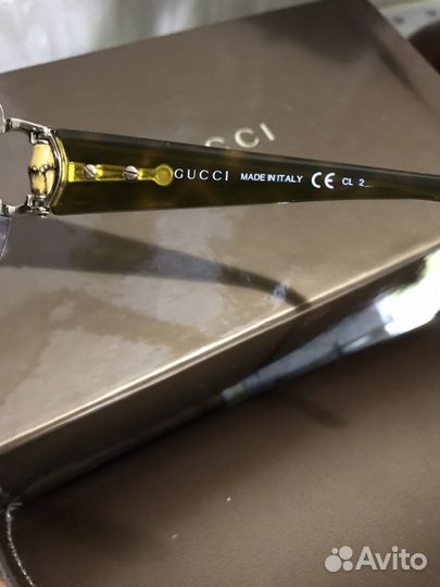 Солнцезащитные очки Gucci