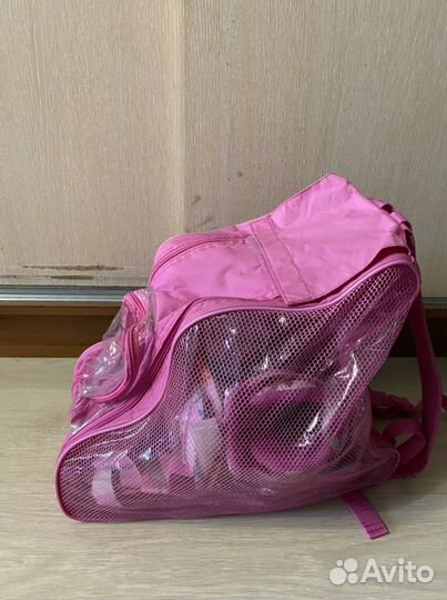 Роликовые коньки