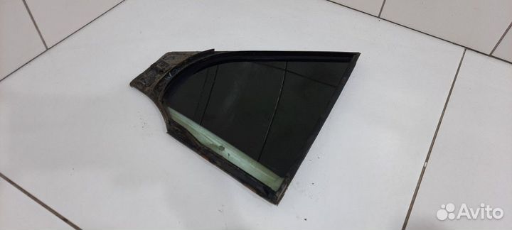 Стекло двери заднее левое глухое (Nissan Primera)