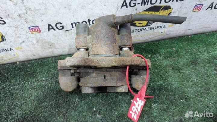 Суппорт тормозной задний левый BMW E34