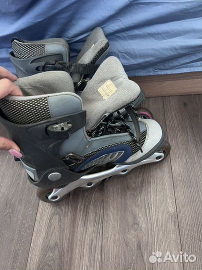 Роликовые коньки