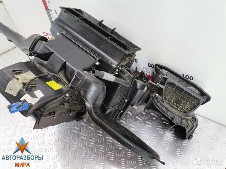 Отопитель в сборе (печка) Opel Astra 13227511