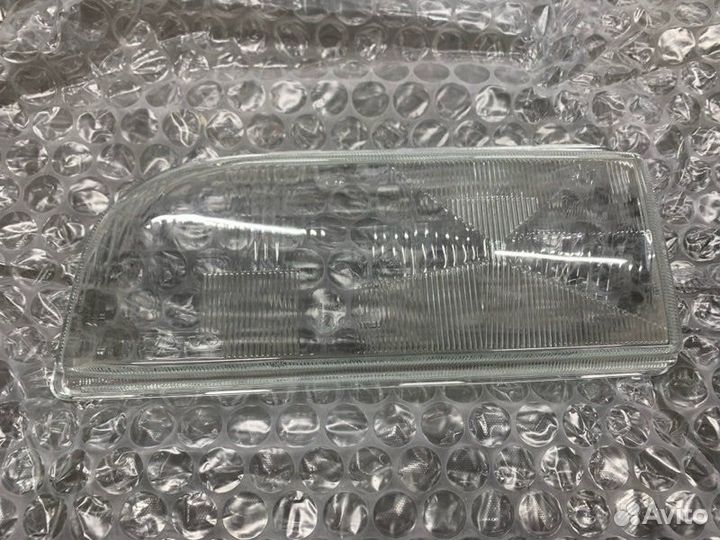 Стекло фары левое Volvo 850