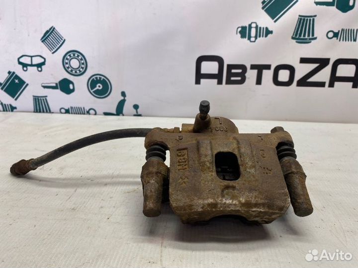 Суппорт тормозной задний левый Mitsubishi Lancer 9