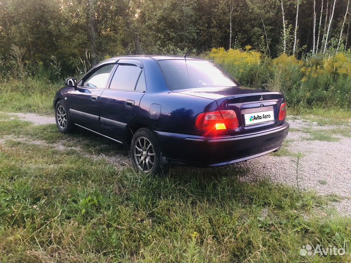 Mitsubishi Carisma 1.3 МТ, 2003, 299 999 км