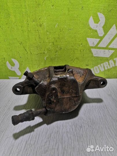 Суппорт передний левый Фольксваген Гольф 3 Венто