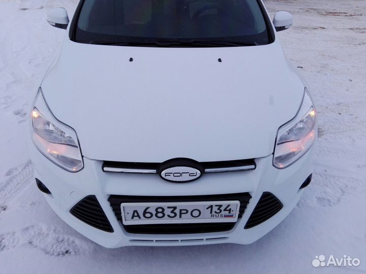 Наклейки на эмблемы Ford Focus