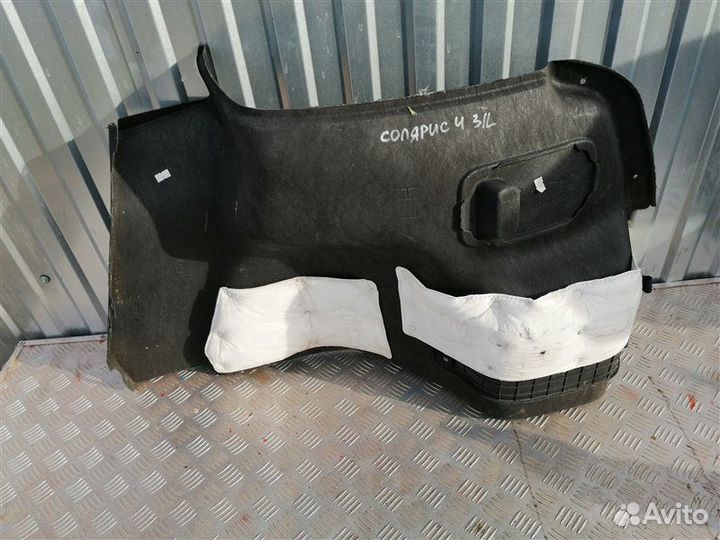 Обшивка багажника задняя левая Hyundai Solaris 2