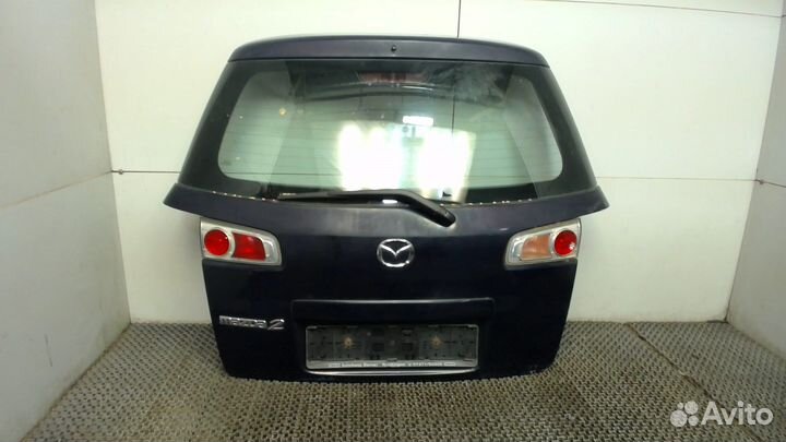 Подсветка номера Mazda 2, 2006