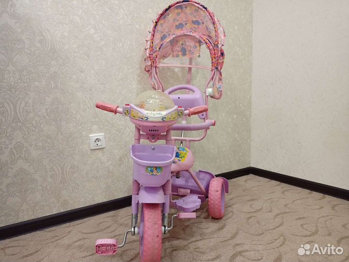 Трехколесный велосипед с ручкой для девочки