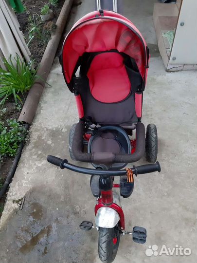 Трехколесный велосипед с ручкой