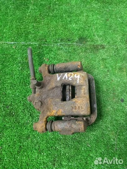 Суппорт тормозной задний правый Nissan Qashqai J10