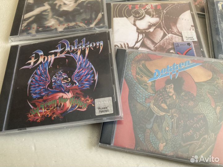 Компакт диски фирма(Tesla-Spread Eagle-Dokken)