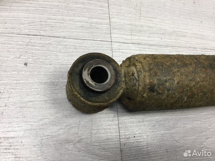 Амортизатор подвески задний левый Nissan