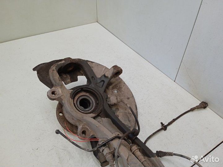 Кулак поворотный передний левый Volkswagen Touareg