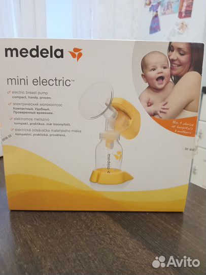 Молокоотсос medela mini electric