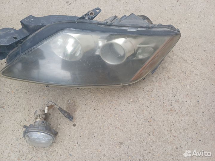 Передние фары на мазда сх7 2010г