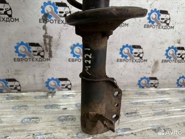 Амортизатор передний левый Mazda 323 Fba hatchback