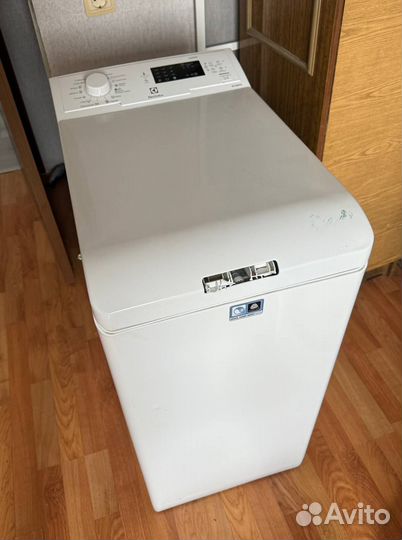 Стиральная машина с вертикальной загрузкой