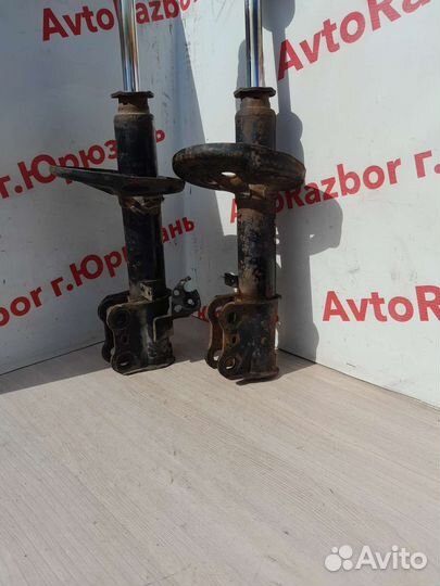 Передние стойки Toyota Carina E