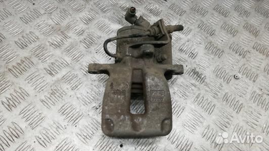 Суппорт тормозной задний левый volkswagen passat B