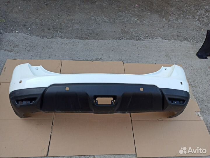 Бампер задний Ниссан Х-Траил белый