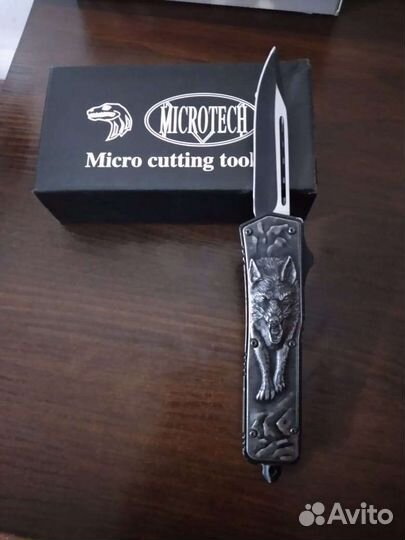 Кнопочный нож Волк