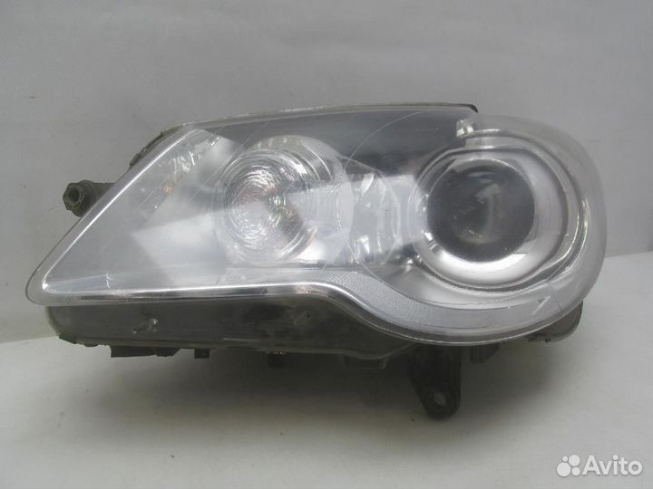 Фара левая Volkswagen Touran