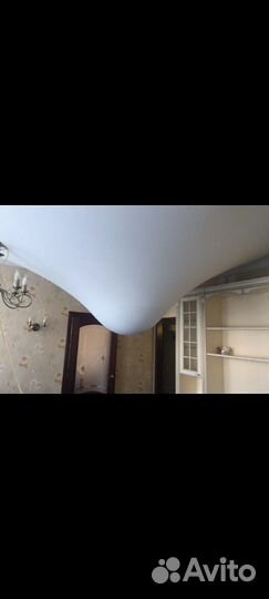 Слив воды с натяжного потолка