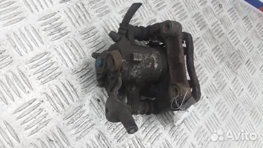 Суппорт тормозной задний левый opel astra H (GEA18