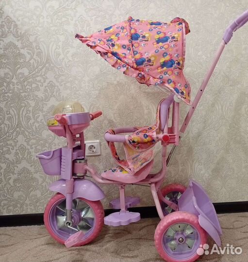 Трехколесный велосипед с ручкой для девочки