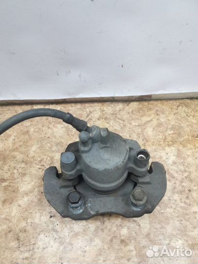 Суппорт тормозной передний левый Ford Focus 2