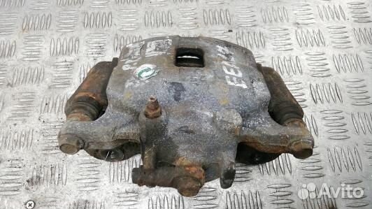 Суппорт тормозной передний правый mitsubishi L200