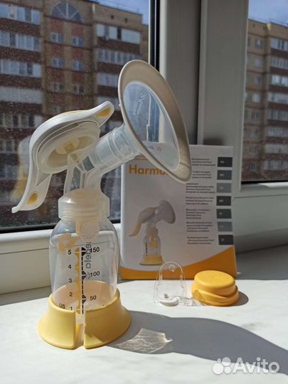 Молокоотсос medela ручной и пакеты для молока