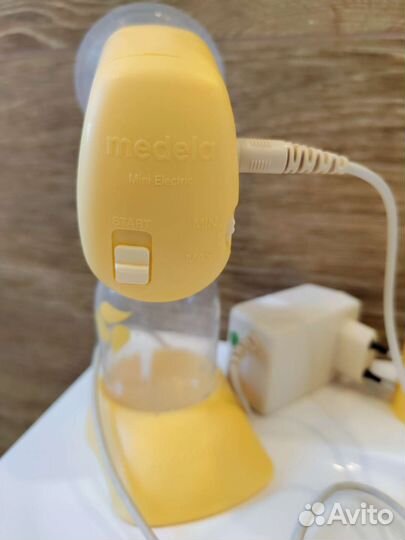 Молокоотсос medela электрический