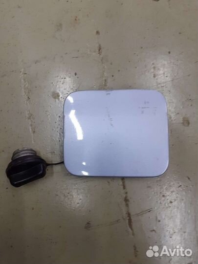 Лючок бензобака Nissan Tiida