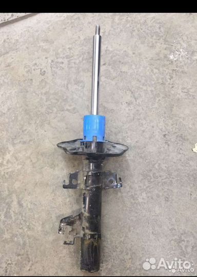 Амортизатор передний левый