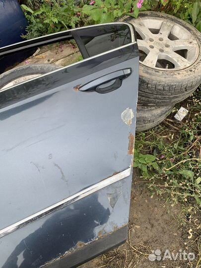 Дверь задняя левая passat б6