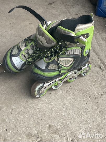 Роликовые коньки