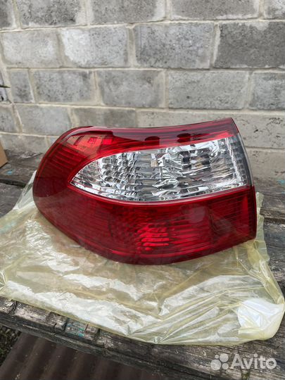 Задний фонарь мазда626 седан