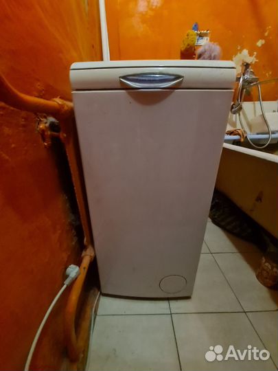 Стиральная машина с вертикальной загрузкой