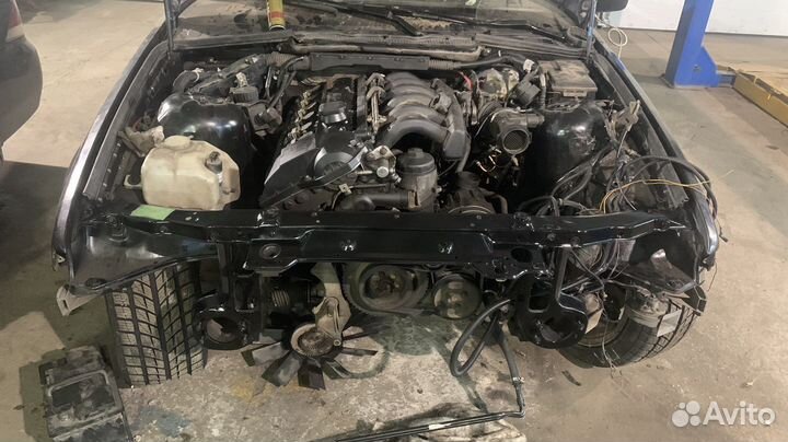 Двигатель м52б20