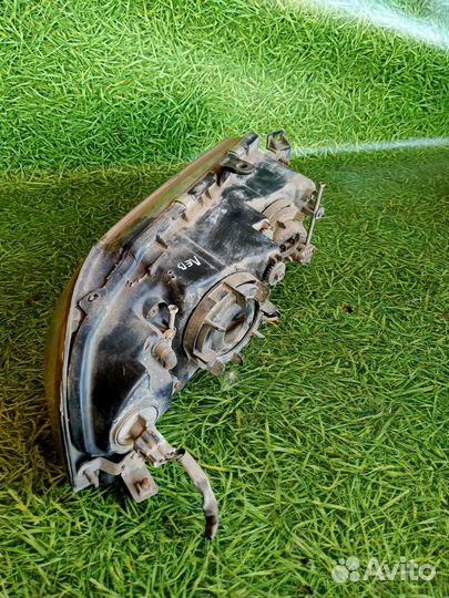 Фара передняя левая для Митсубиси Диамант 3.0л 95г