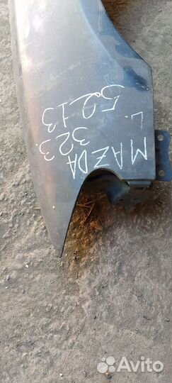 Крыло левое Мазда 323