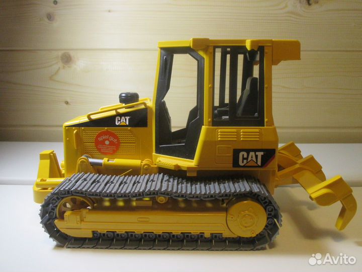 Игрушка модель Бульдозер CAT caterpillar bruder