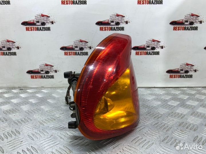 Фонарь задний задний левый Kia Spectra седан S6D