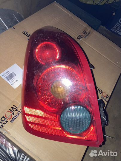 Фонарь задний левый Ниссан Примера Р12