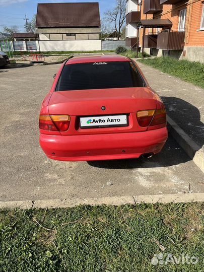 Mitsubishi Carisma 1.6 МТ, 1997, битый, 394 000 км