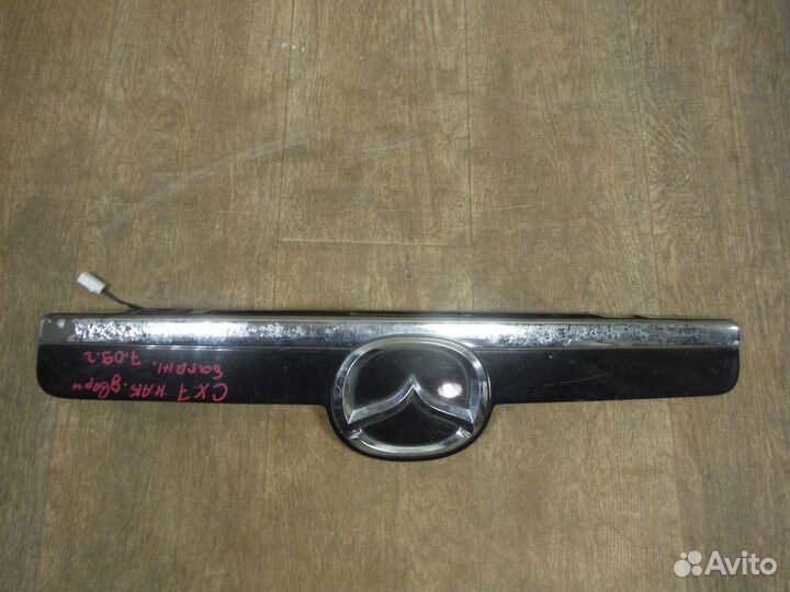 Накладка крышки багажника Mazda CX7 2009