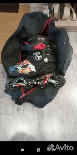 Роликовые коньки